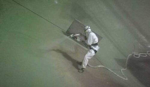 image with a man working